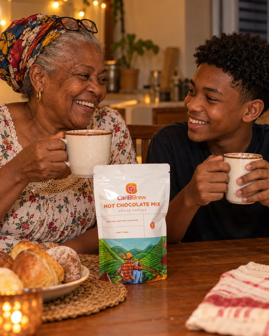 Grandmother and grandson sharing hot chocolate at the table